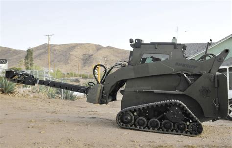 up armored skid steer|bobcat armored vehicle.